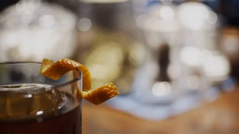 Cocktail with orange peel Stock Footage 124031887