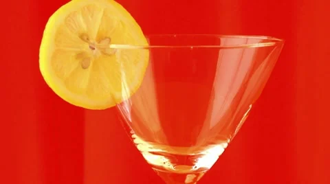 Cocktail over red background Stock Footage 7140796