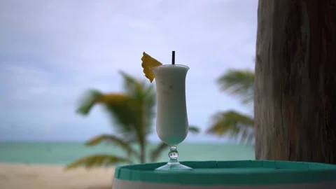 Cocktail Pina Colada smoothie on the bar stands Stock Footage 178481853