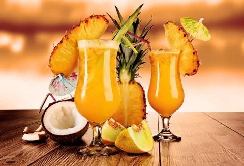 Cocktail of pineapple and melon Stock Photos