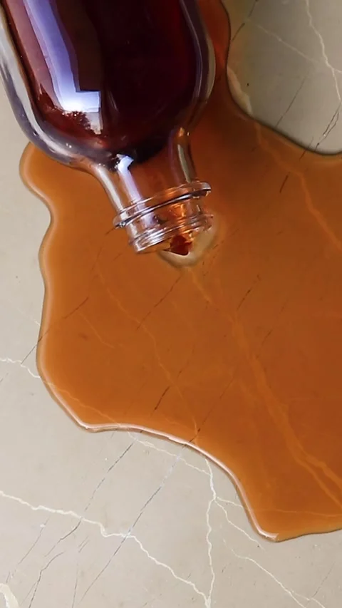 The cocktail is pouring out of the bottle Stock Footage 305228366