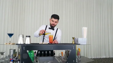 Cocktail preparing technique performed by a barman Stock Footage 72735425