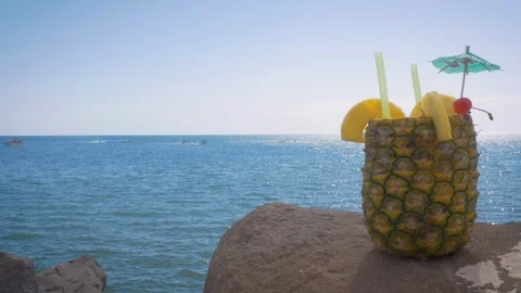 Cocktail Served in a Fresh Pineapple at a Oceanfront Resort in 4k Stock Footage 98270393