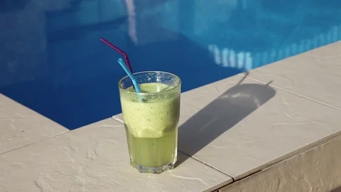 Cocktail Smoothie near pool Stock Footage