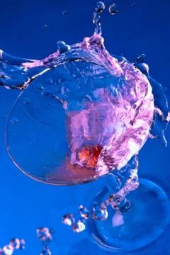 Cocktail with splashes Stock Photos