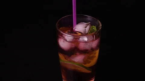 Cocktail stir drinking straw super slow mo Video stock 72945717