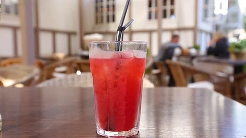 Cocktail on table Stock Footage 70079775