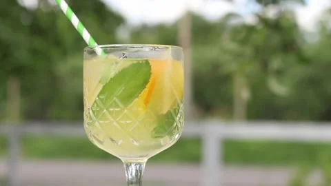 Cocktail on a table in the open air, viranda Stock Footage 310466336