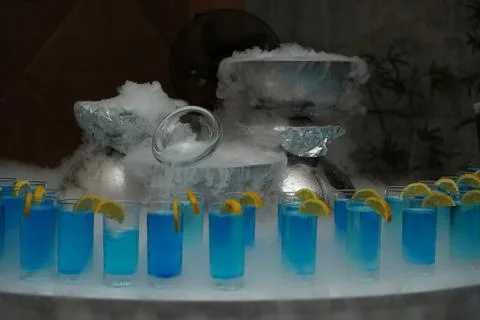 Cocktail table with smoke Stock Photos