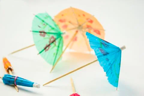 Cocktail umbrellas Stock Photos