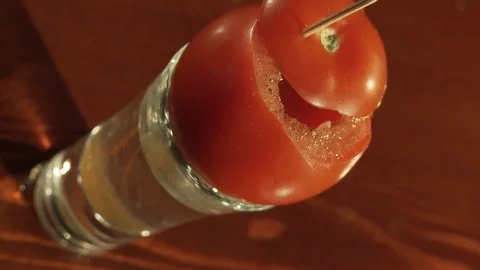 Cocktail vodka with tomatoes. Stock Footage 80309654