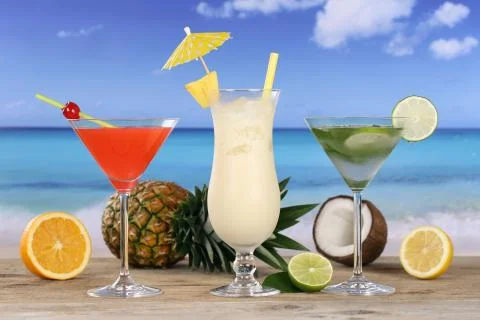Cocktails and drinks on the beach and sea Stock Photos