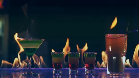 Cocktails on fire on a bar Stock Footage 106641352