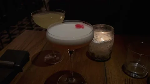 Cocktails in glasses on the table Stock Footage 232324348