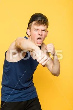 Cocky arrogant fighter street thug hooligan fist Stock Photos