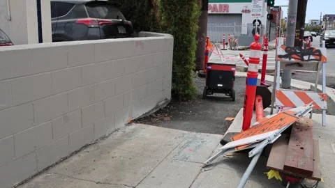 Coco Robotics autonomous food delivery robot navigating sidewalk construction Stock Footage 340569746