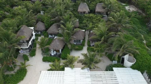 Coco Tulum Pan out from Beach Front Cottages 1 動画素材 137428293