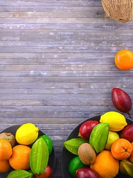 Coco on vintage table and some tropical fruits Stock-Fotos