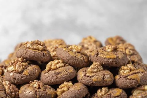 Cocoa and walnut cookies. Fresh walnut cookies. Bakery products. close up Stock Photos