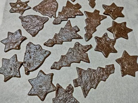 Cocoa biscuits in the shape of Christmas decorations Photos