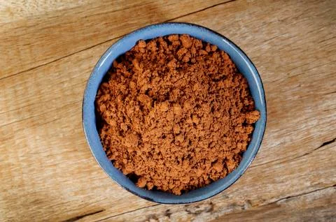 Cocoa in bowl Stock Photos