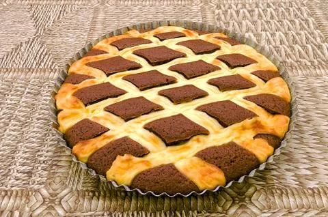 Cocoa cake with cottage cheese grating Stock Photos