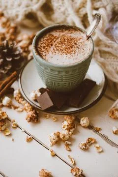 Cocoa, chocolate, popcorn, ginger biscuits and knitted blanket, Cozy winter.. Stock Photos