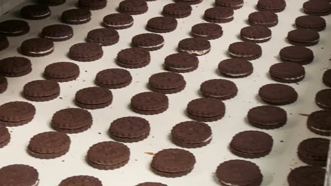 Cocoa cookies from two layers with cream Stock Footage 86018548