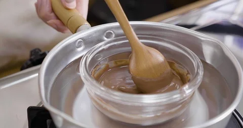 Cocoa cream stirred with spoon to make non-gluten Video stock 103264243
