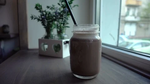 Cocoa near window Video stock 107600563