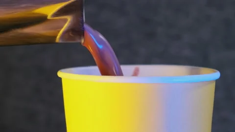 Cocoa is poured into a cup. Slow motion. Stock Footage 183967154