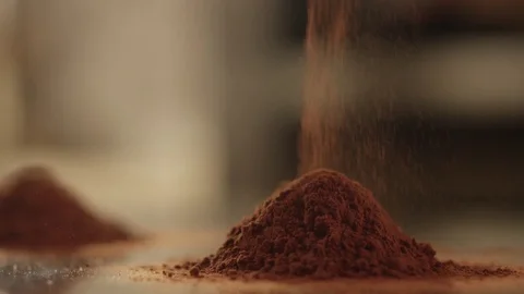 Cocoa powder fall on glass RAPID 100fps (FEW SHOTS) Stock Footage