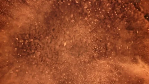 Cocoa powder falls on the table. Filmed on a high-speed camera at 1000 fps. Stock Footage 308469192