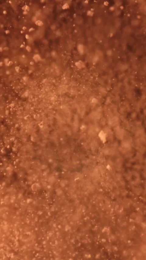 Cocoa powder falls on the table. Filmed on a high-speed camera at 1000 fps Stock Footage 335384244