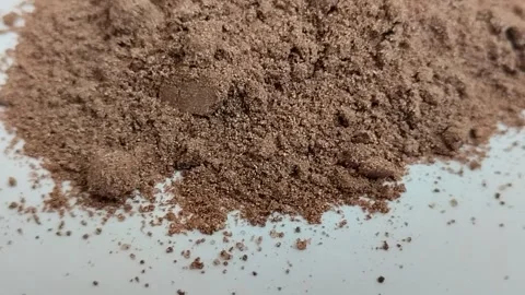 Cocoa powder on a white background Stock Footage 311749452