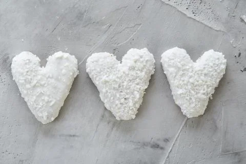 Coconat biscuits arranged in pattern on light textured background, close-up Stock Photos