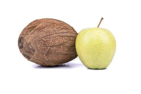 Coconut and apple Stock Photos