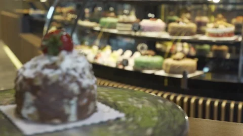 Coconut and cocoa cake rotating on the table Stock Footage 167589824