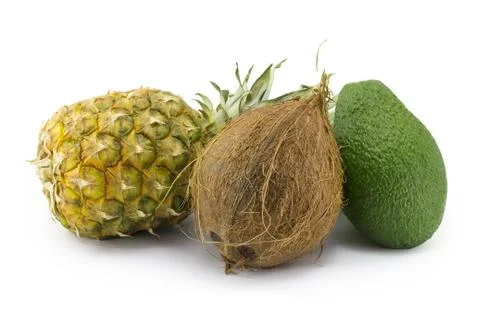 Coconut, avocado, pineapple Stock Photos