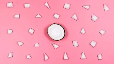 Coconut background. Coconuts on a pink background. Foto stock