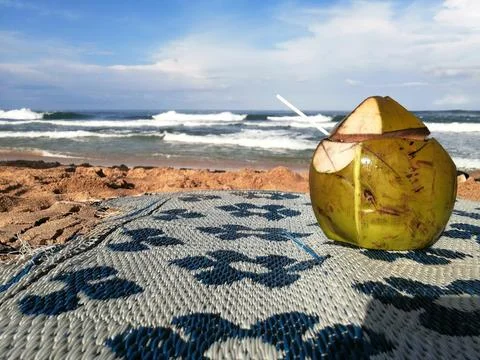 Coconut on the beach Stock Photos