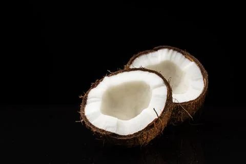 Coconut on a black background Stock Photos