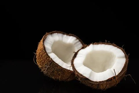 Coconut on a black background Stock Photos