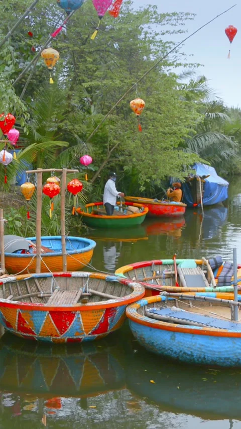 Coconut Boats on Thu Bon River, Hoi An, Quang Nam, VN with lanterns Stock Footage 331546910