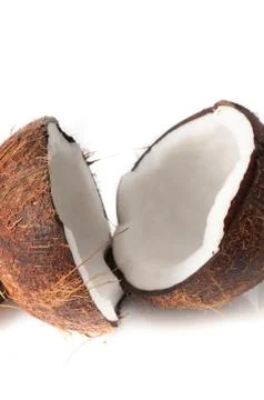 Coconut broken in half Stock Photos