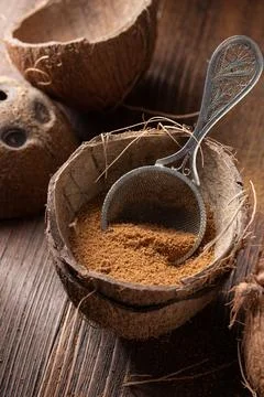 Coconut brown sugar in a coconut shell Stock Photos
