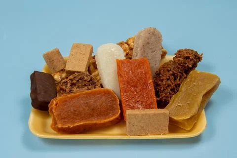 Coconut candy, pumpkin candy, pacoca, peanut butter, pacoca, Stock Photos