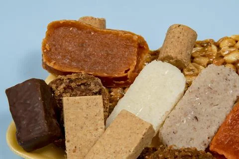 Coconut candy, pumpkin candy, pacoca, peanut butter Stock Photos