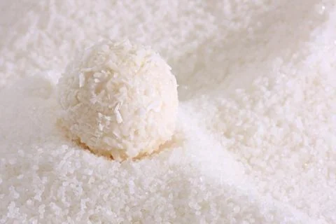 A coconut candy is in sugar. Fotos de archivo