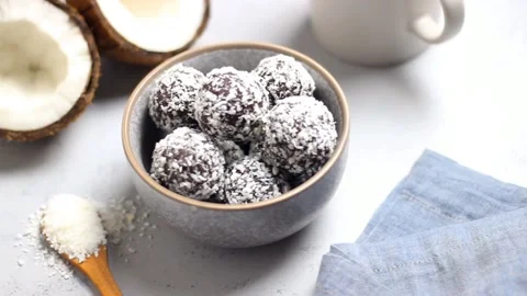 Coconut chocolate balls. Candy. Dessert. Vegetarian food. Stock Footage 213869633